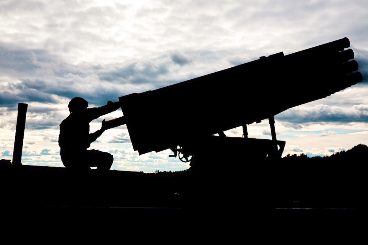 a-croatia-land-forces-soldier-loads-a-122mm-rocket-into-a-m-92-vulkan__altered-7Z2IA3